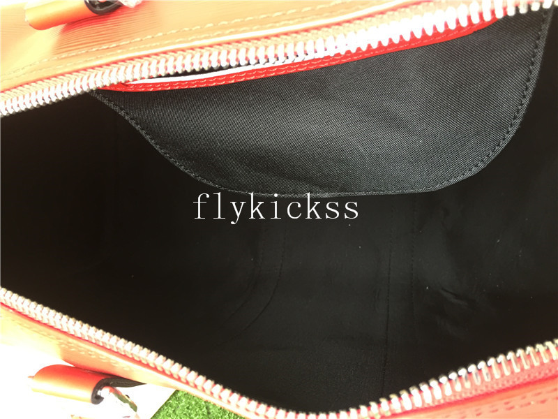 Supreme LVS Traveling Red Duffle Bag